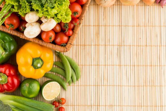 Various vegetables on a bamboo mat.