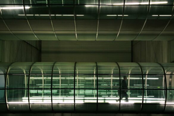 A photo of a tunnel at an airport.